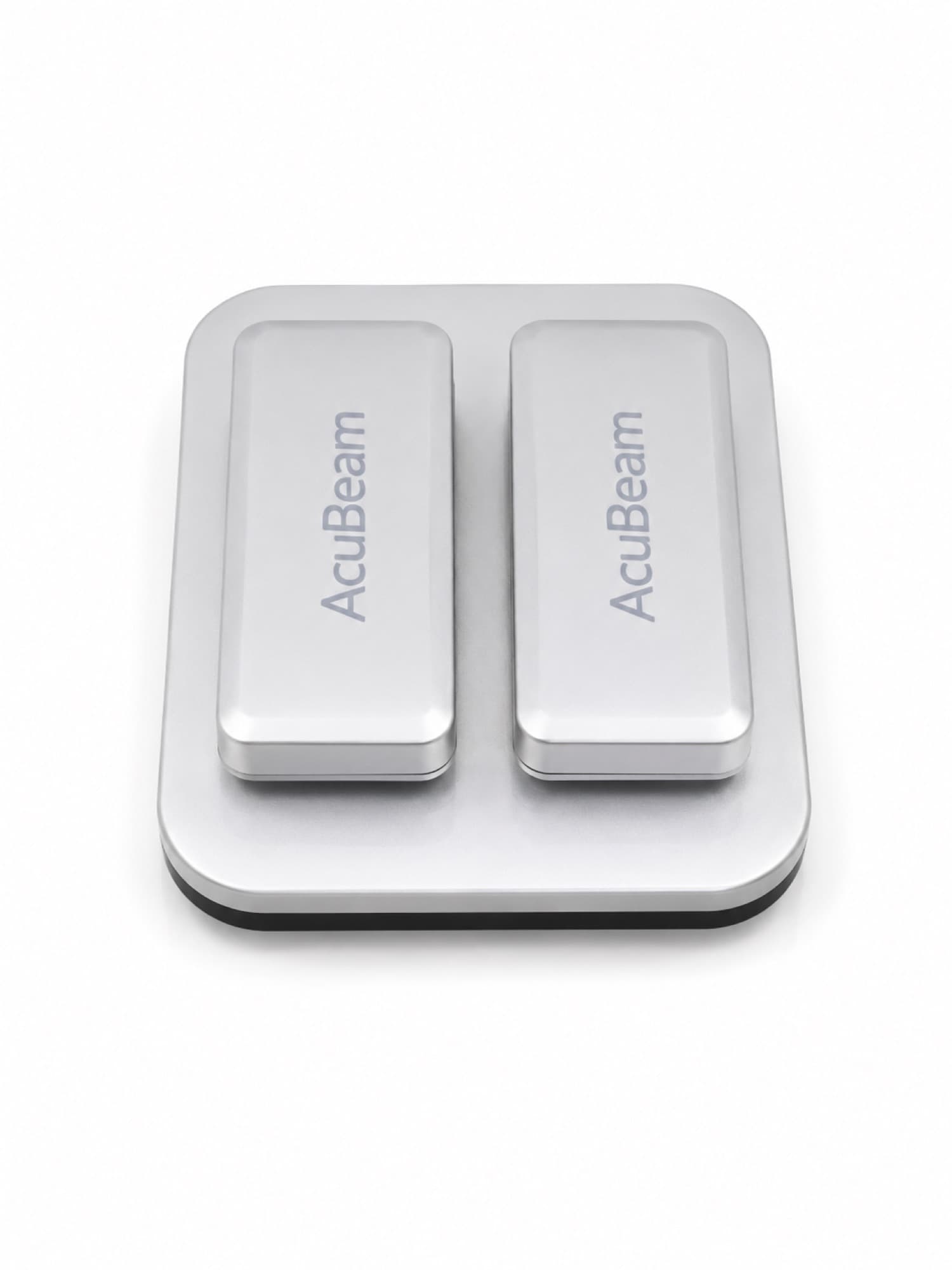 The AcuBeam headlight kit: lamp head, batteries, and charging dock