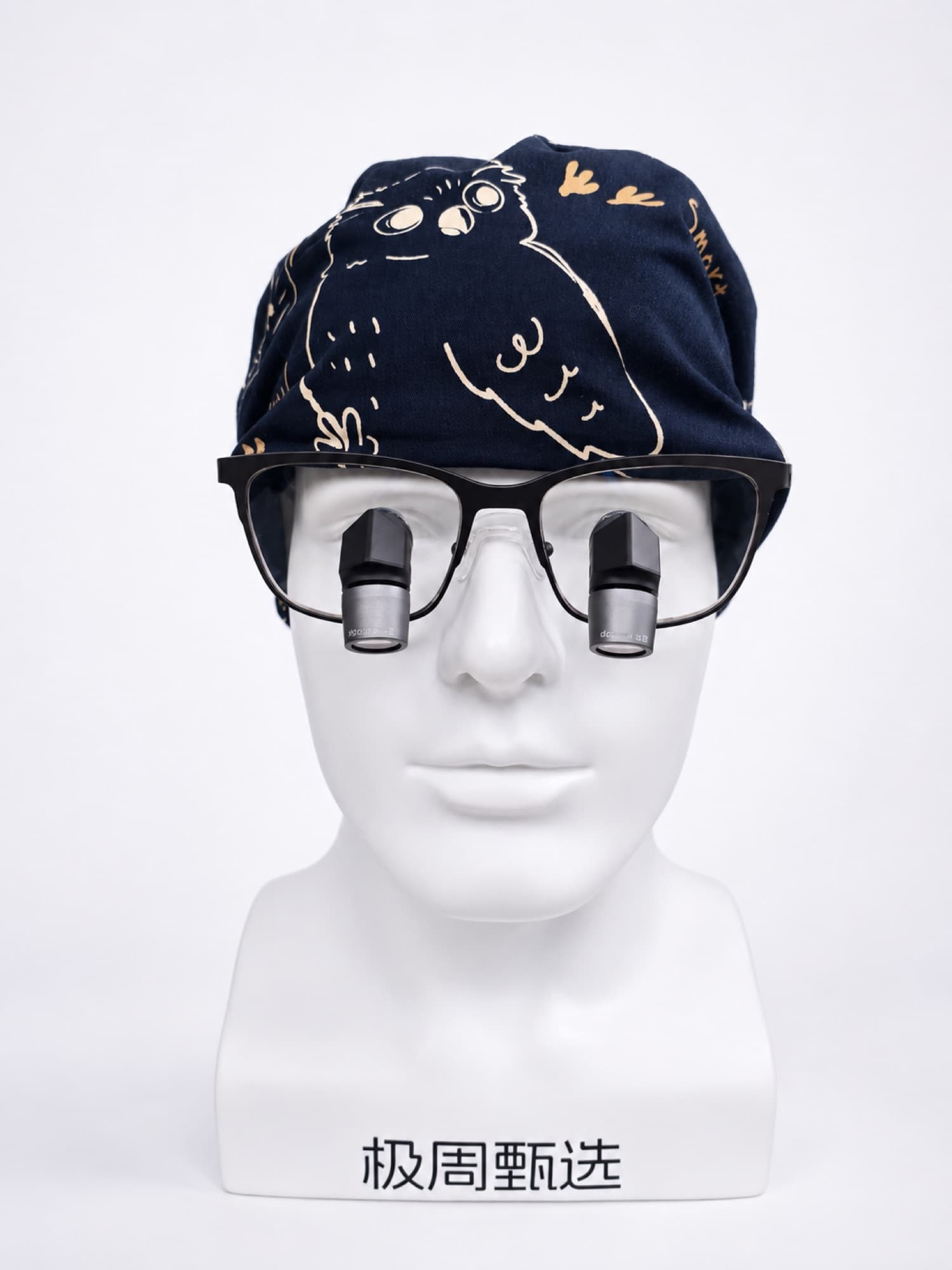 Head model wearing AcuView Pro prismatic loupes (1)