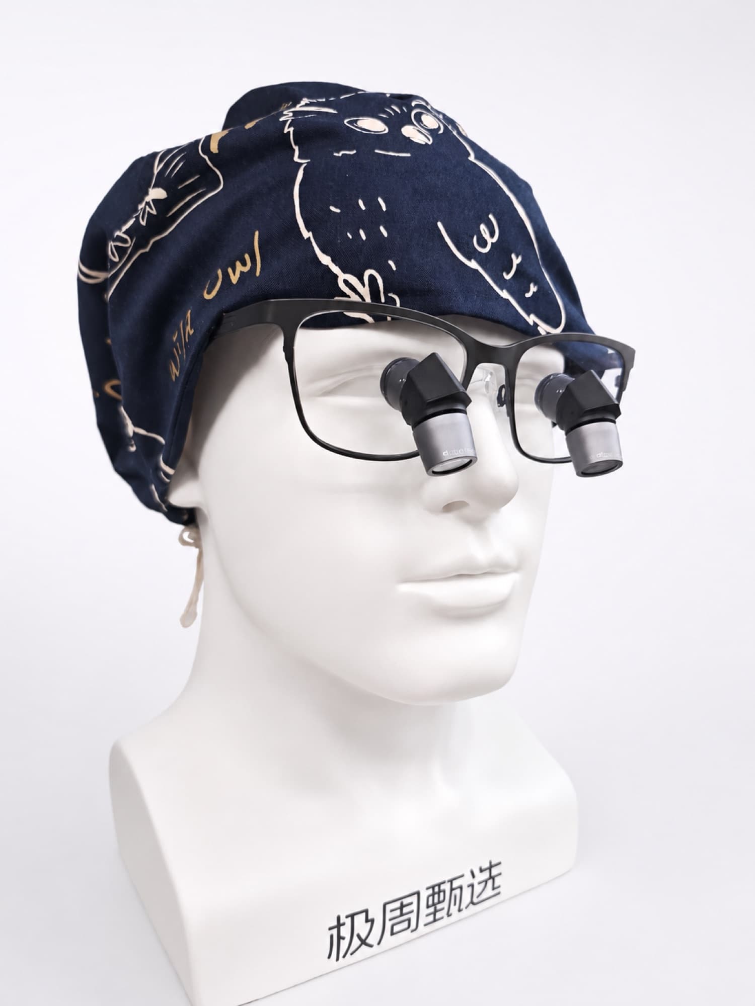 Head model wearing AcuView Pro prismatic loupes (2)